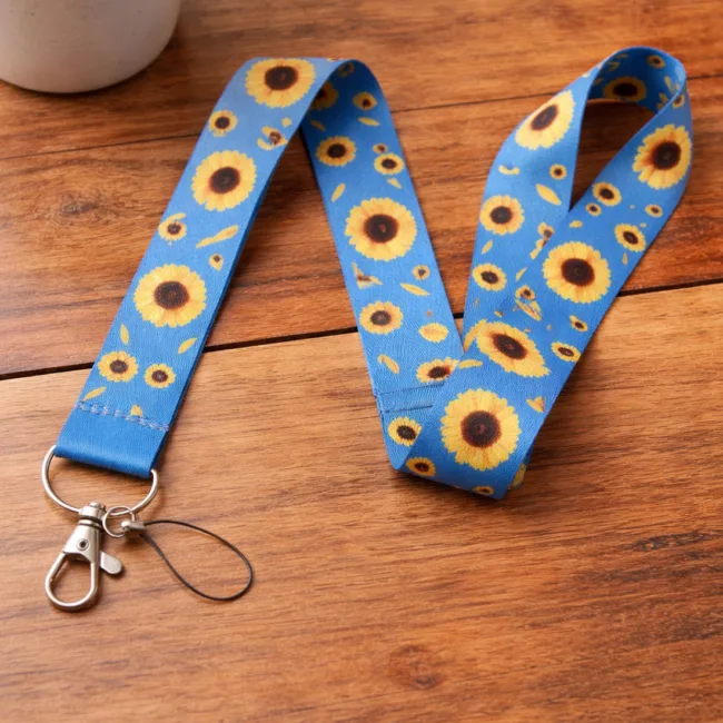 keycord zonnebloemen blauw